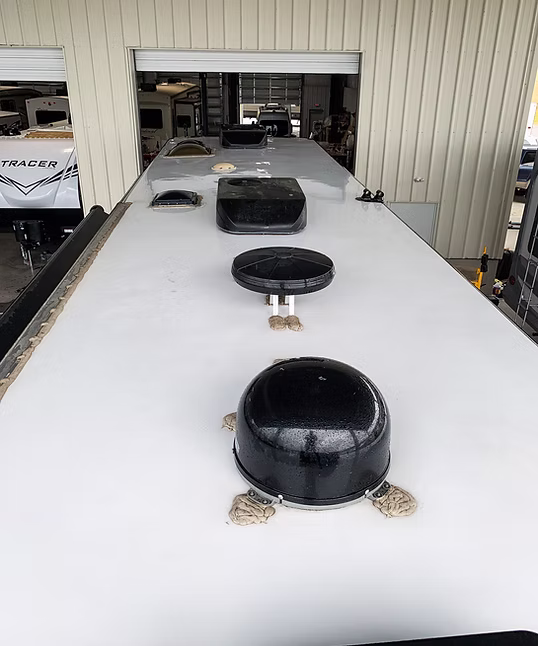 RV roof being serviced